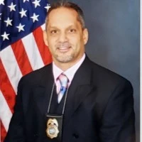 Sgt. Martin Discharges Firearm in Public Building – $40,000 in Damages